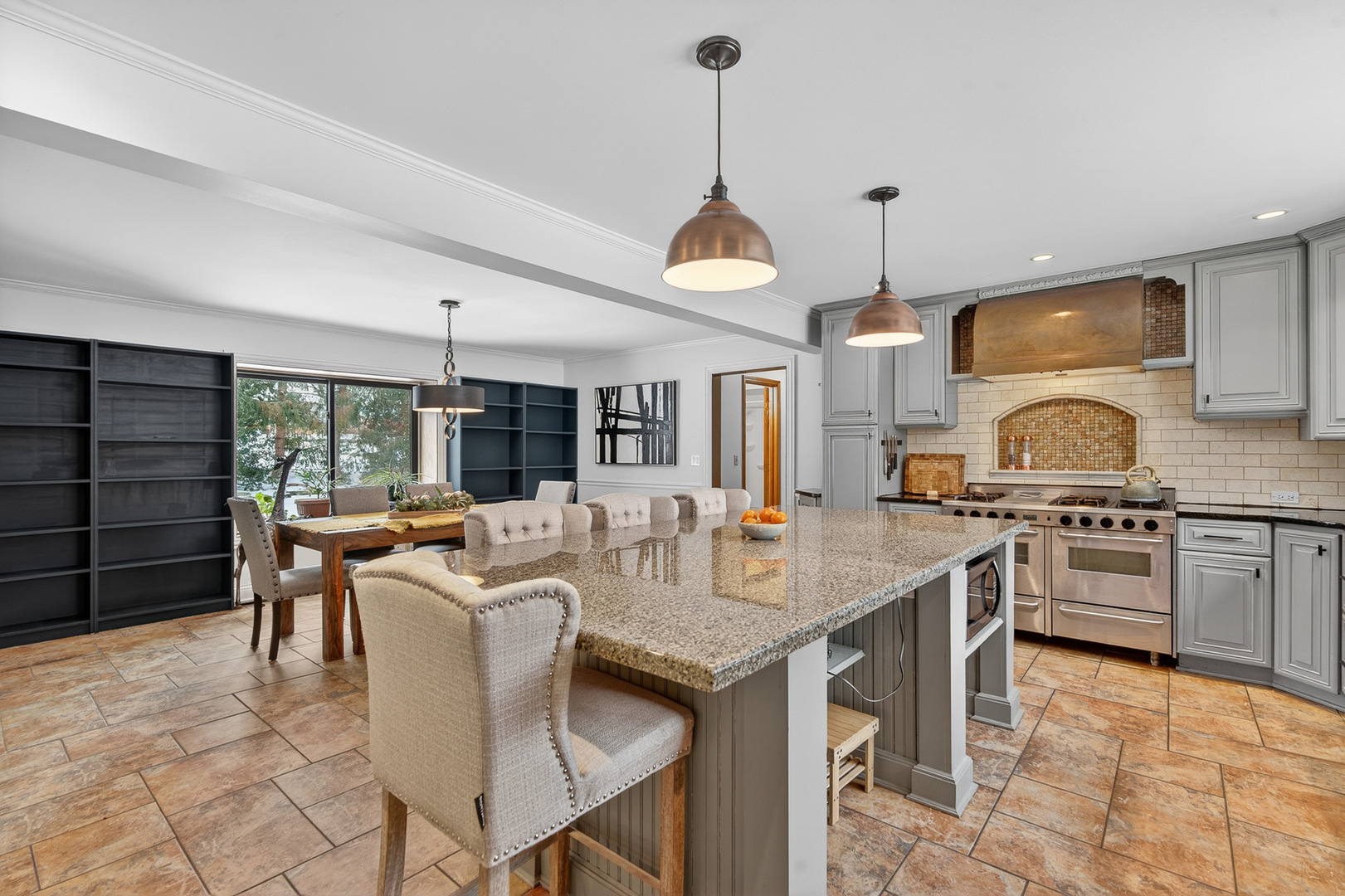 1275 Country Club Road Lake Zurich, IL 60047 - Photo 17 of 49 a large kitchen with a table and chairs