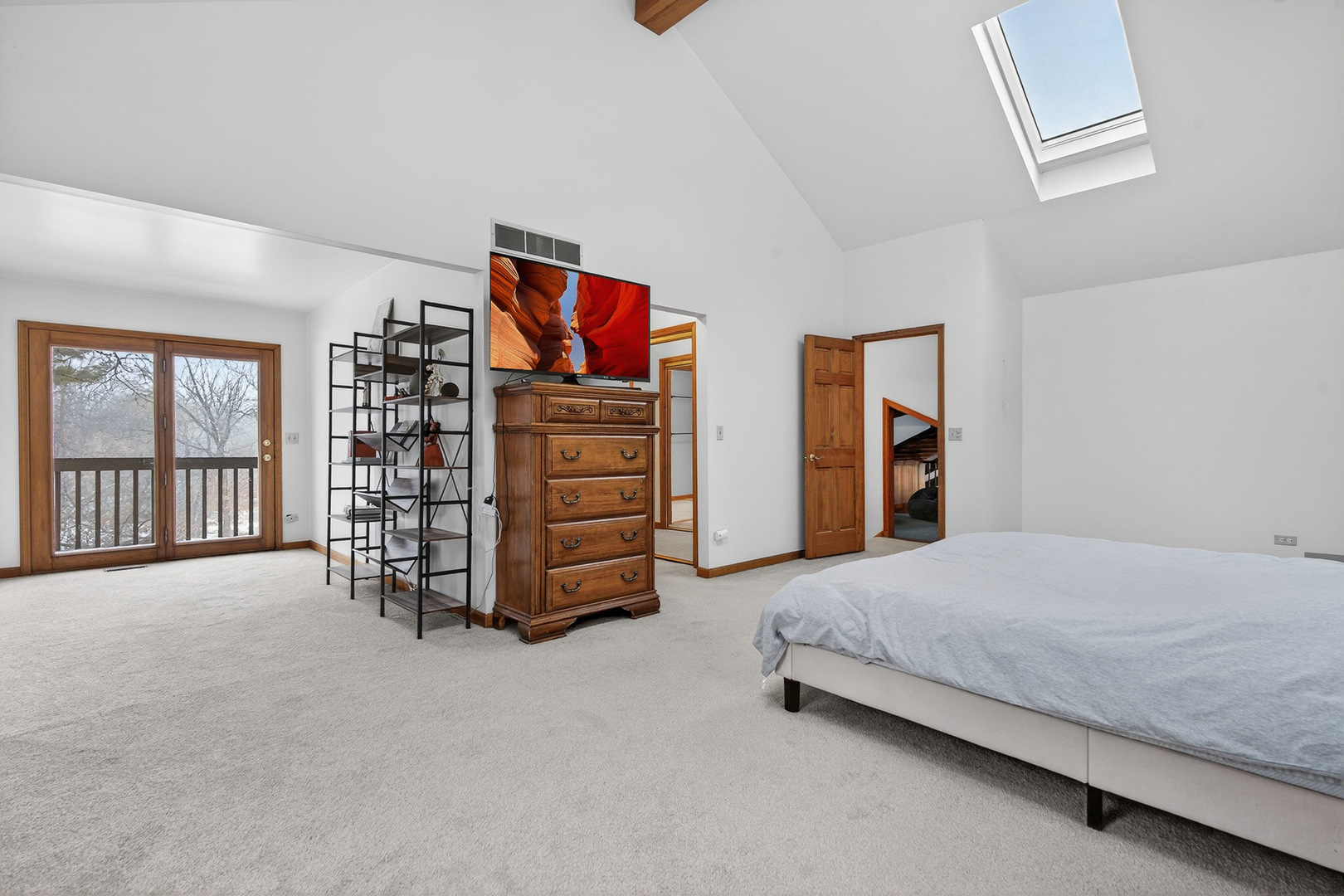 1275 Country Club Road Lake Zurich, IL 60047 - Photo 25 of 49 a spacious bedroom with a bed and a walk in closet