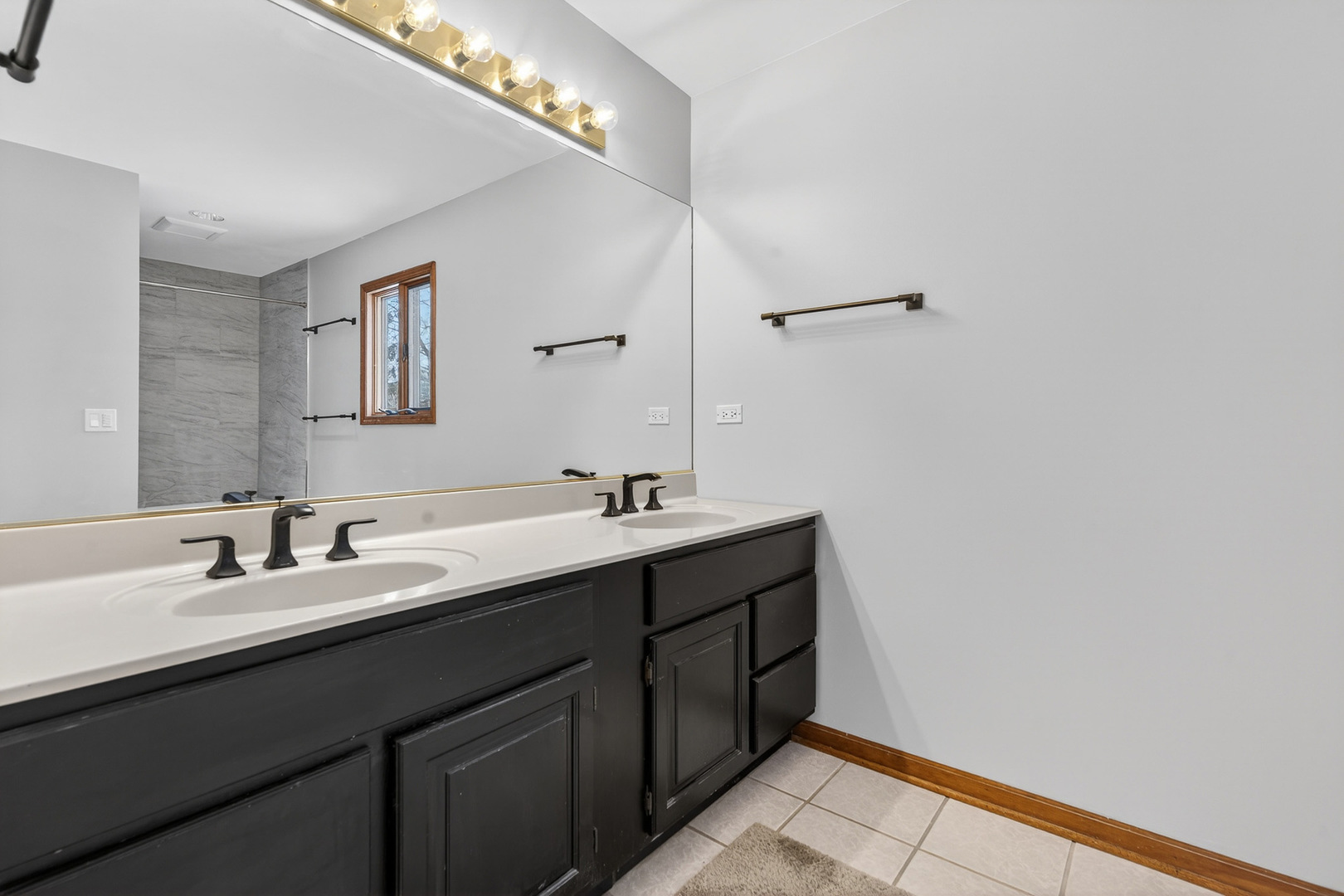 1275 Country Club Road Lake Zurich, IL 60047 - Photo 27 of 49 a bathroom with a double vanity sink and a mirror