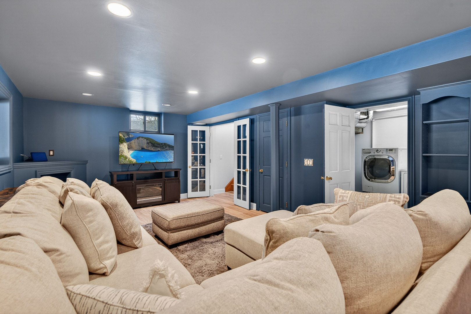 1275 Country Club Road Lake Zurich, IL 60047 - Photo 30 of 49 a bedroom with furniture a mirror and a chandelier