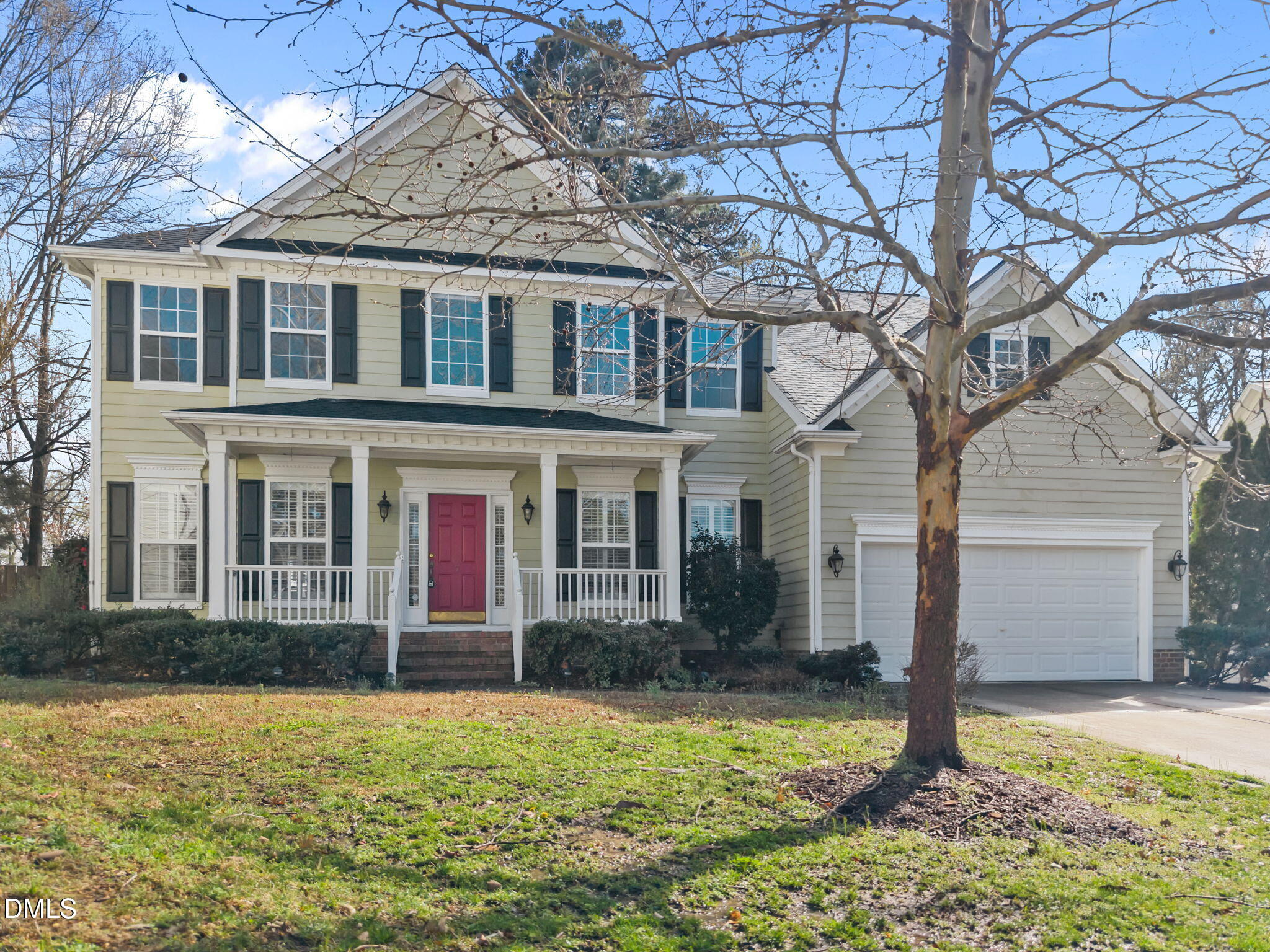 front view of a house with a yard