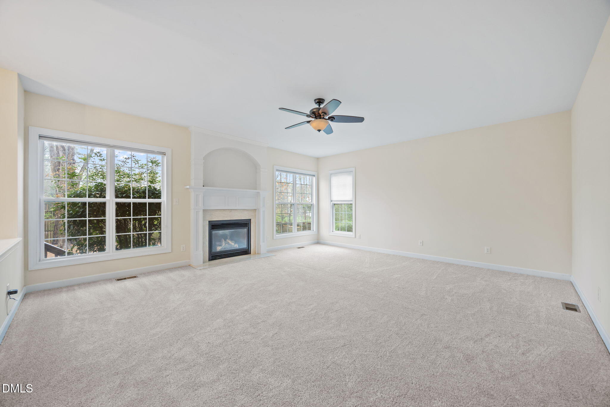 7 Bobcat Court Durham, NC 27713 - Photo 12 of 64 a view of a livingroom with a fireplace and a large window