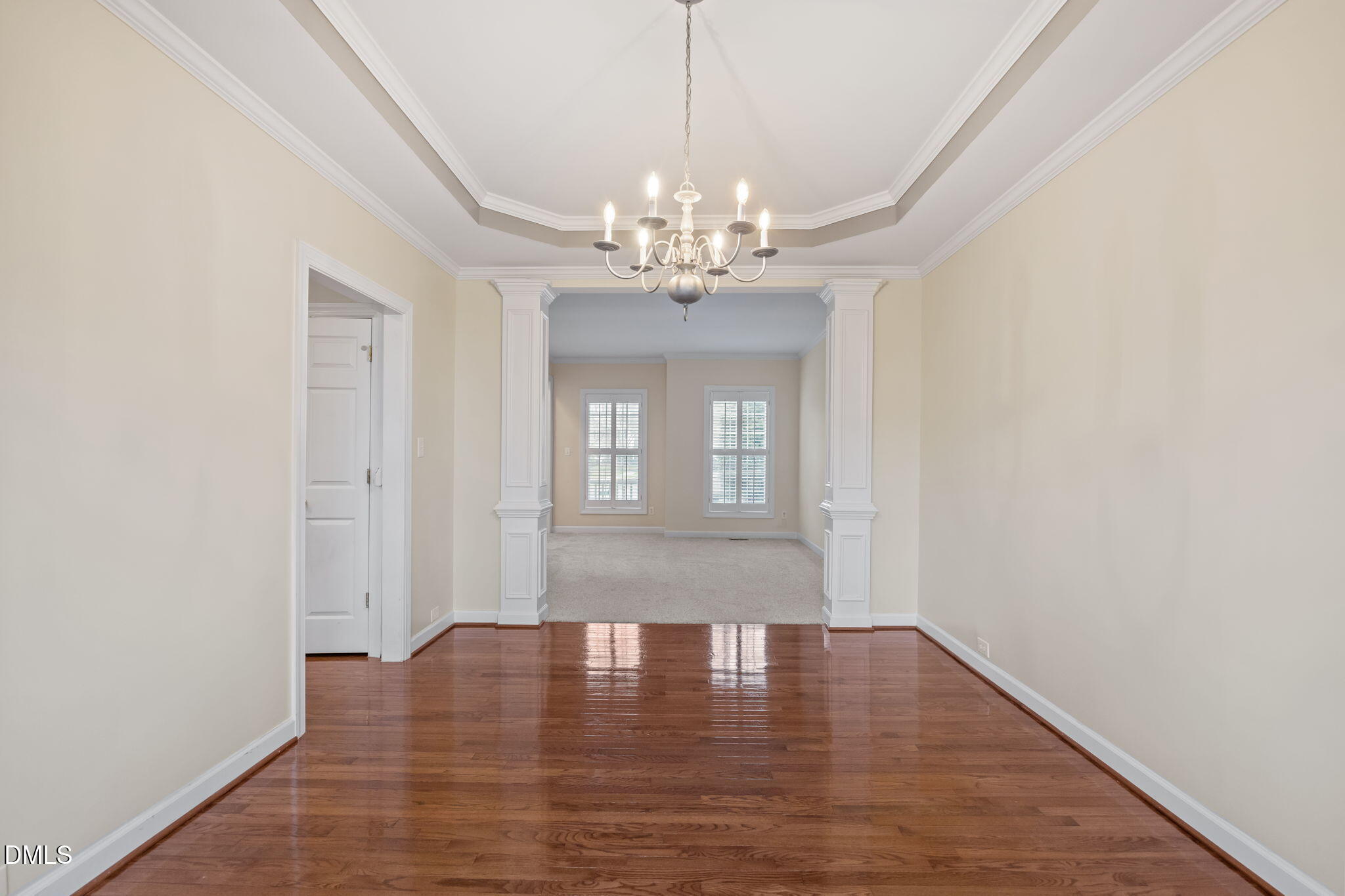 7 Bobcat Court Durham, NC 27713 - Photo 14 of 64 a view of an empty room with wooden floor and a window