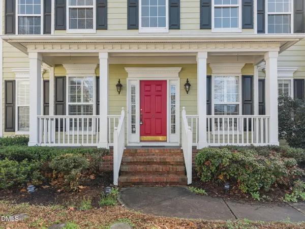 a view of entryway with wooden floor and stairs