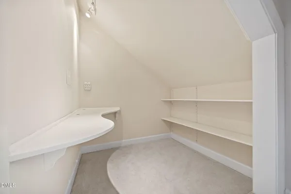 a bath tub sitting in a bathroom next to a window