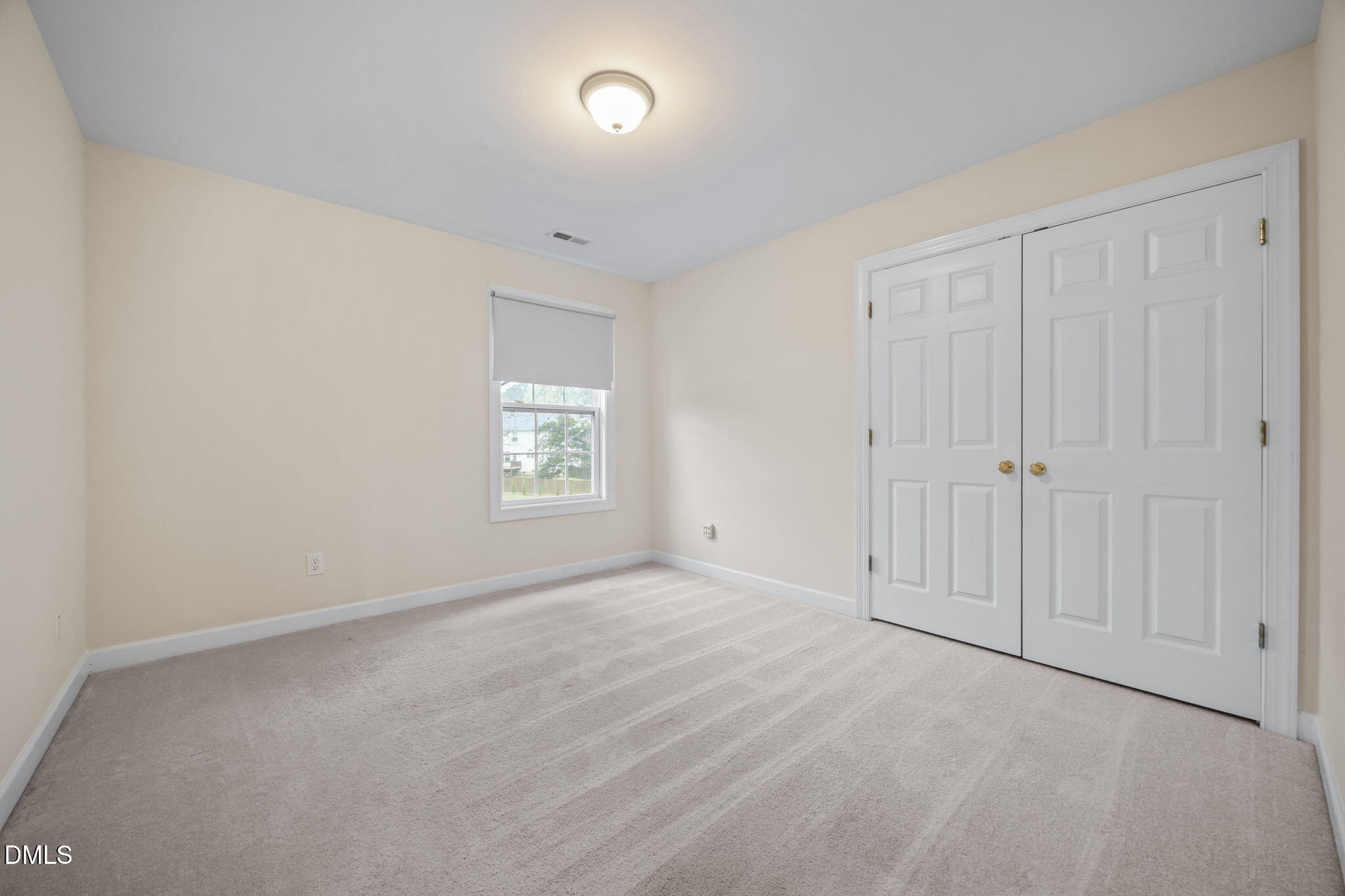 7 Bobcat Court Durham, NC 27713 - Photo 34 of 64 an empty room with windows