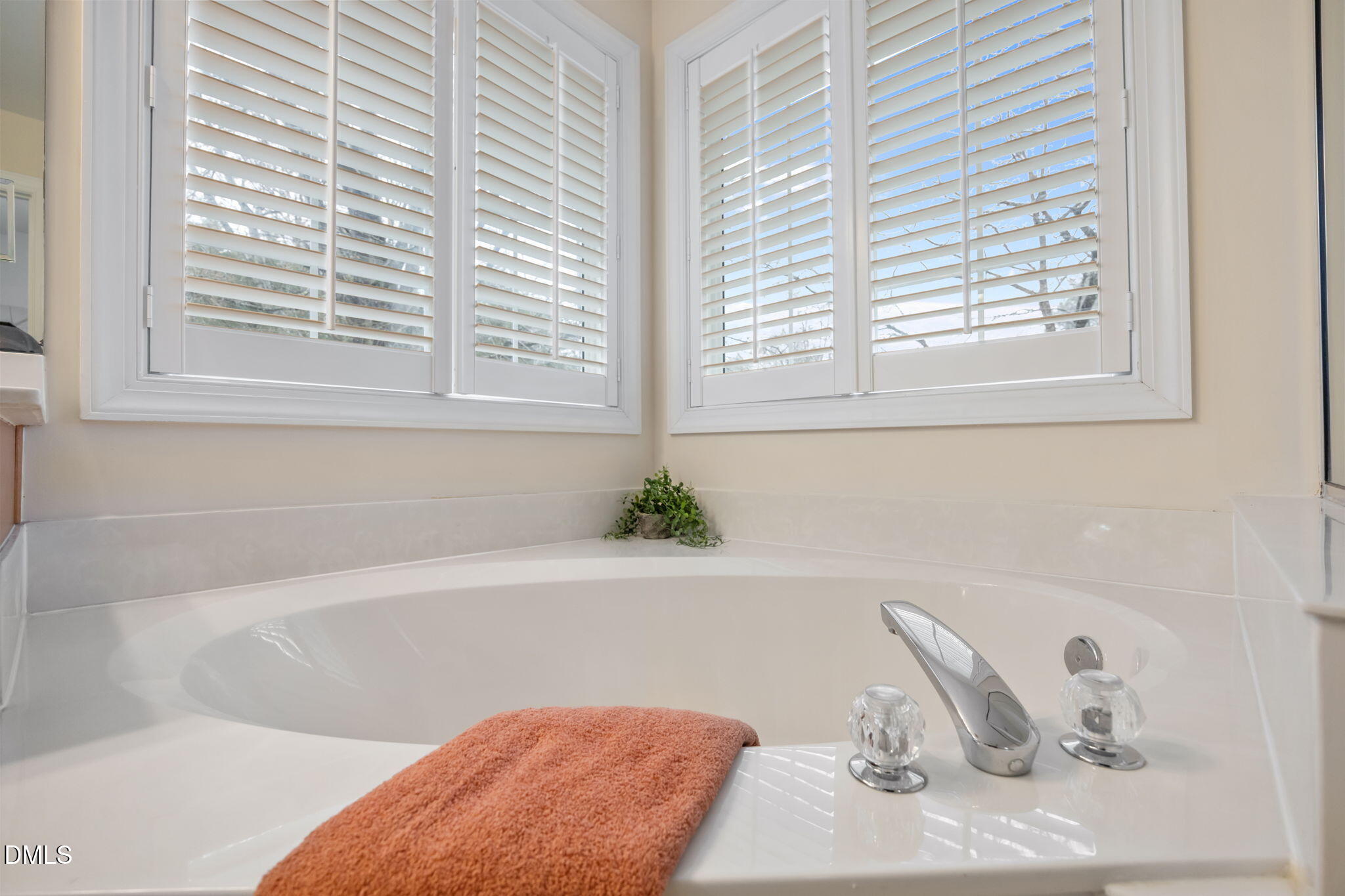 7 Bobcat Court Durham, NC 27713 - Photo 36 of 64 a bath tub sitting in a bathroom next to a window