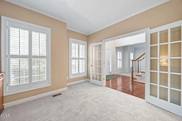 an empty room with windows