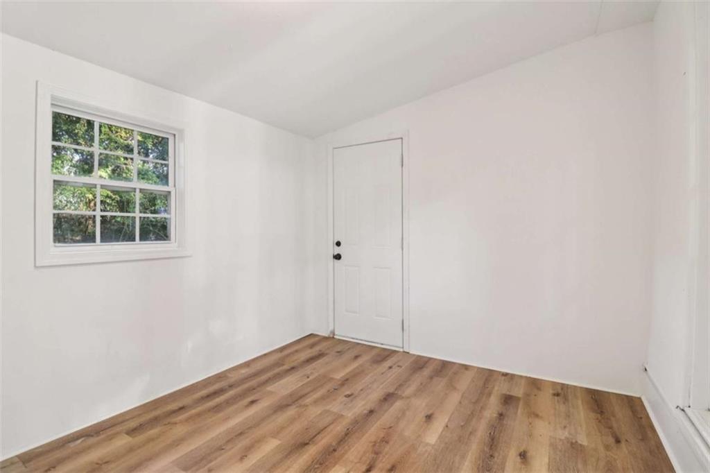 9202 Settlers Grove Road Northeast Covington, GA 30014 - Photo 17 of 45 an empty room with a window