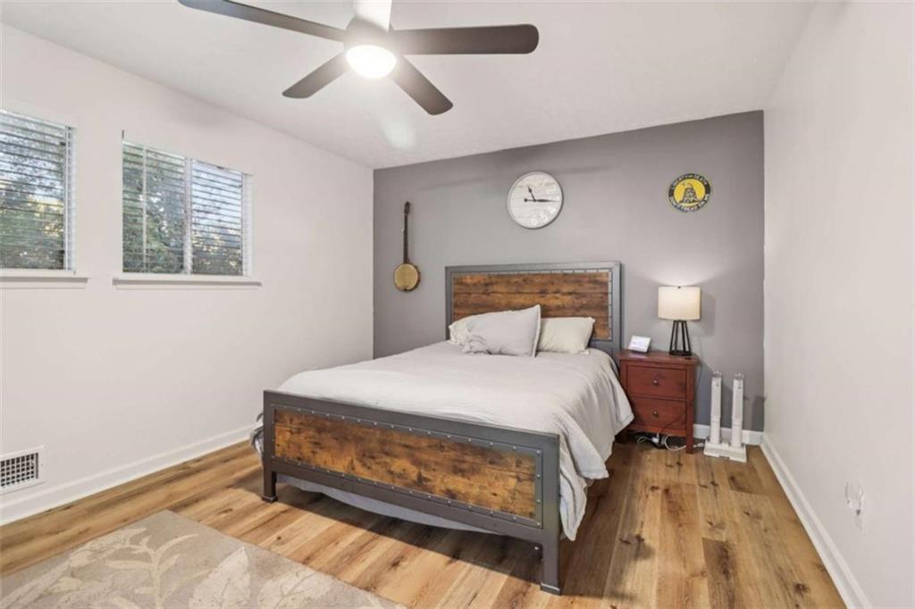 9202 Settlers Grove Road Northeast Covington, GA 30014 - Photo 25 of 45 a bedroom with a bed and a window