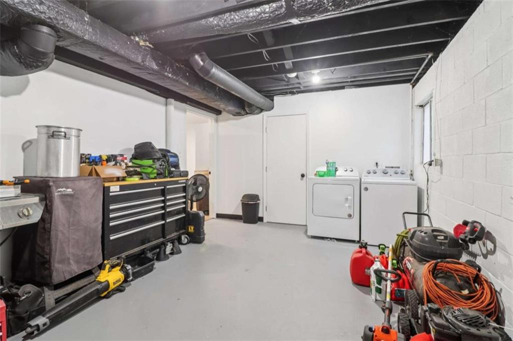 9202 Settlers Grove Road Northeast Covington, GA 30014 - Photo 39 of 45 a view of storage and utility room