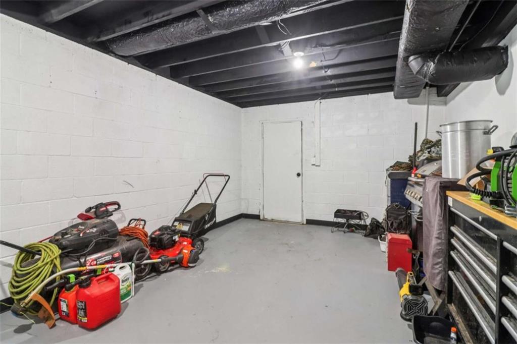 9202 Settlers Grove Road Northeast Covington, GA 30014 - Photo 40 of 45 a view of a room with gym equipment