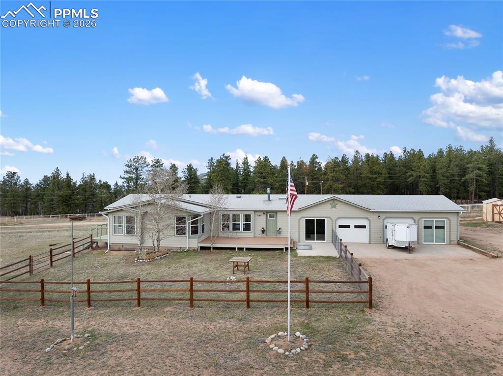 585 Mills Ranch Road Woodland Park, CO 80863 - Photo 3 of 46 View of front of home with driveway