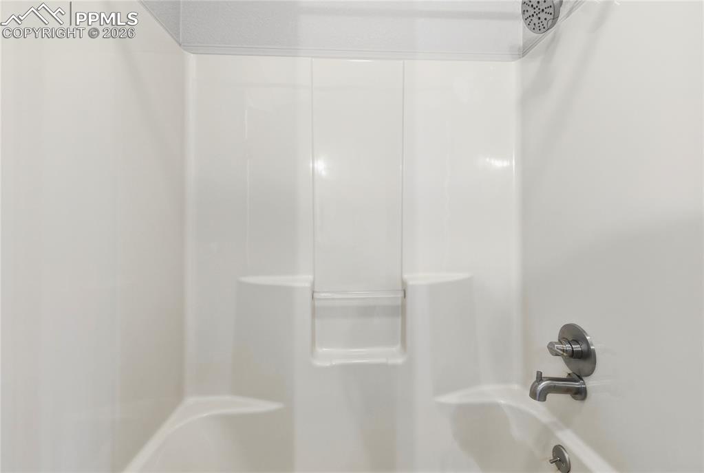 585 Mills Ranch Road Woodland Park, CO 80863 - Photo 32 of 46 Full bathroom featuring a shower