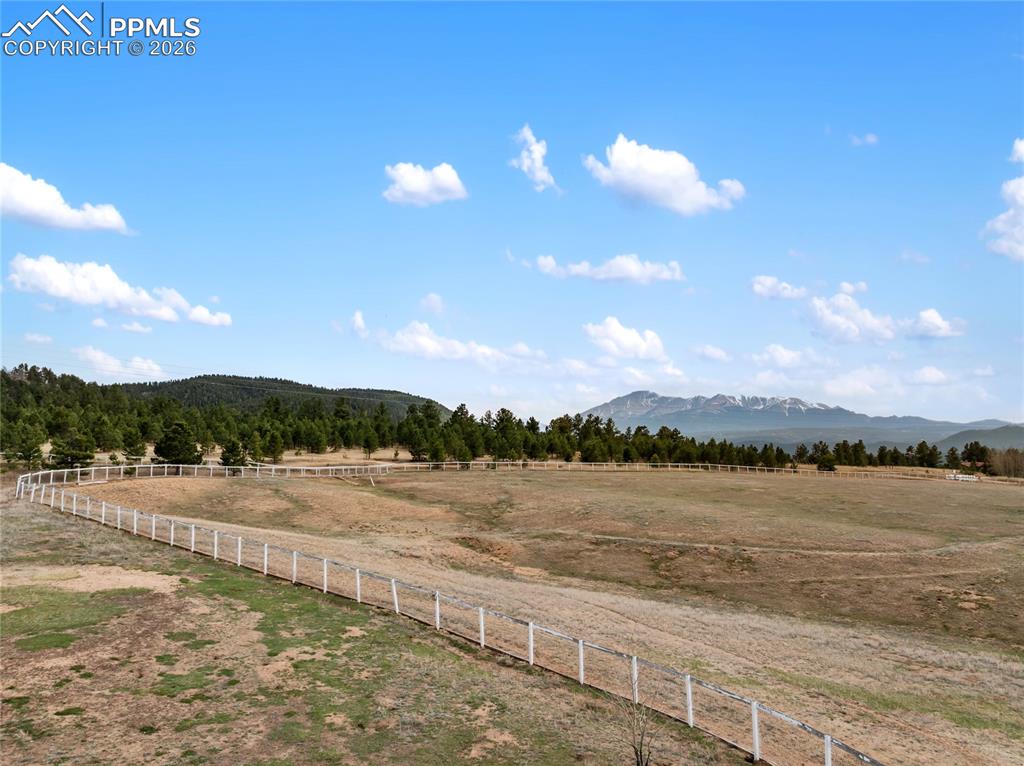 585 Mills Ranch Road Woodland Park, CO 80863 - Photo 8 of 46 View of mountain backdrop featuring rural landscape