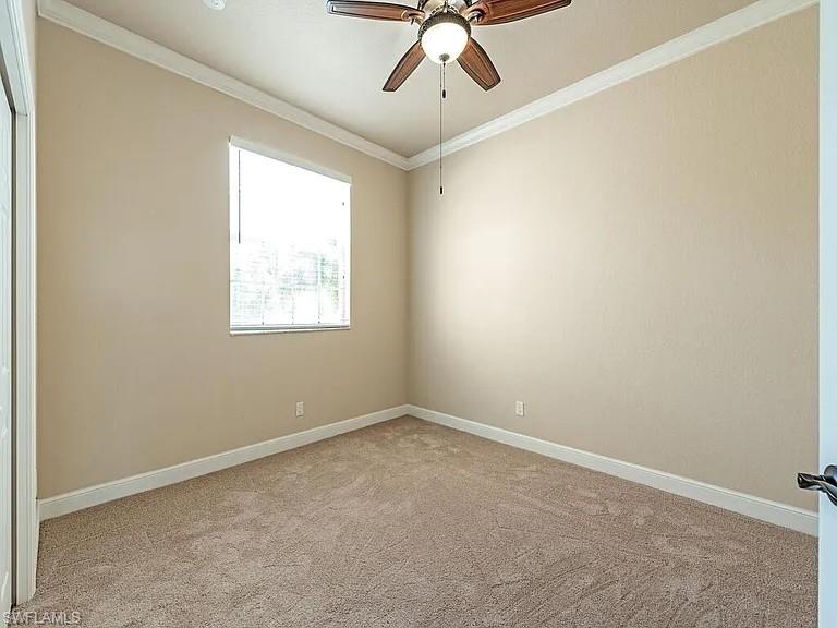 3590 Lansing Loop, Unit 201 Estero, FL 33928 - Photo 4 of 18 an empty room with a window