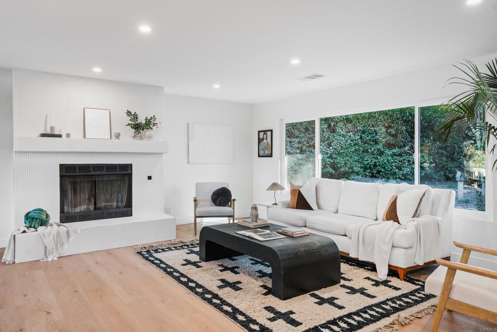 1608 Towell Lane Escondido, CA 92029 - Photo 12 of 35 a living room with furniture and a fireplace