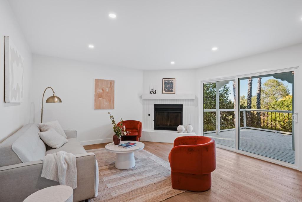 1608 Towell Lane Escondido, CA 92029 - Photo 15 of 35 a living room with furniture and a fireplace