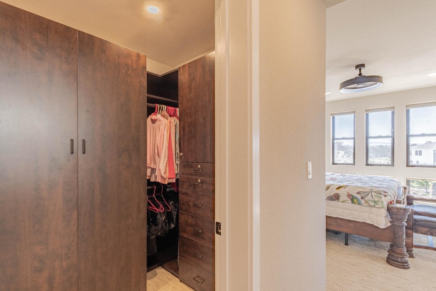 135 8th Street Marina, CA 93933 - Photo 45 of 69 a bedroom with a bed and a window