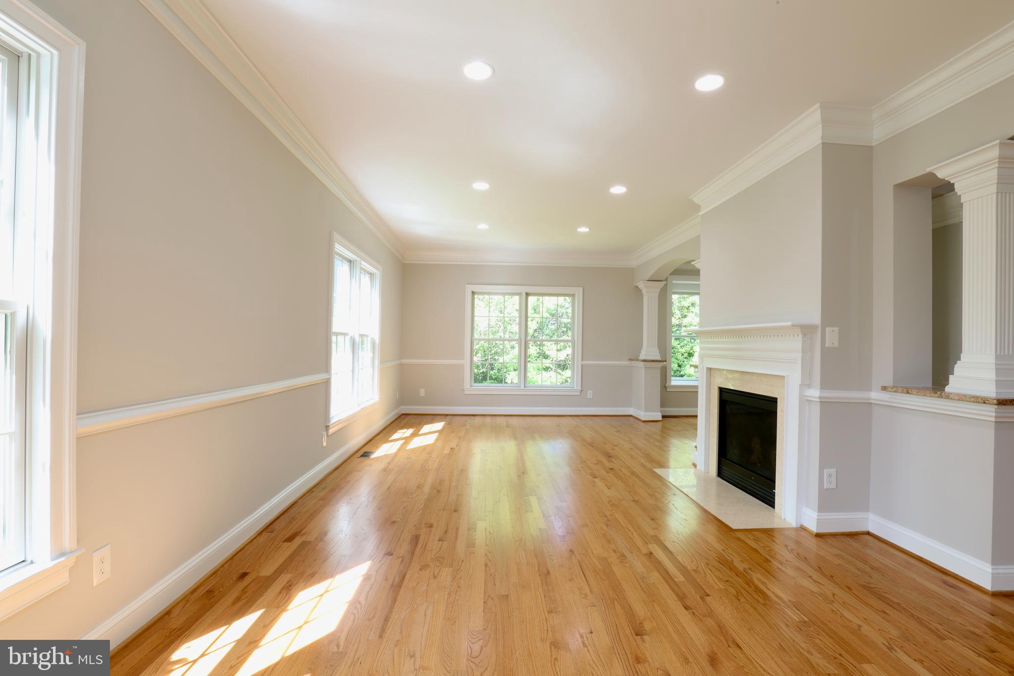 1310 Forestwood Drive McLean, VA 22101 - Photo 11 of 55 a view of an empty room with a window and fireplace