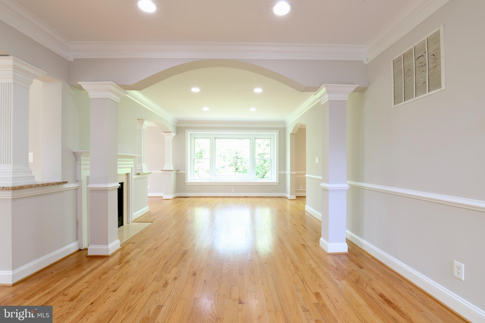 1310 Forestwood Drive McLean, VA 22101 - Photo 12 of 55 a view of empty room with wooden floor and fan