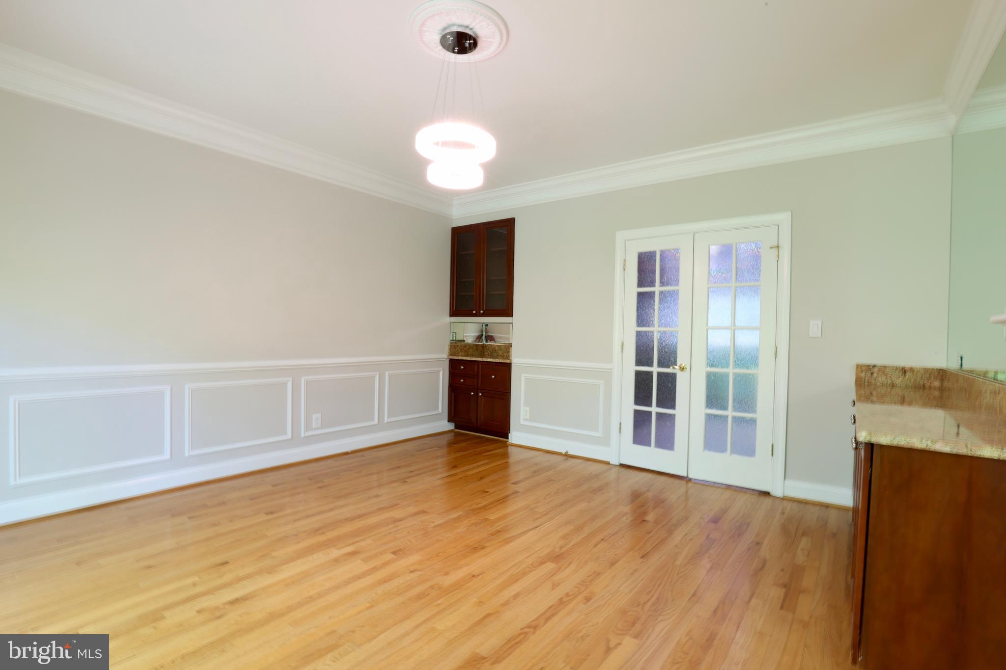 1310 Forestwood Drive McLean, VA 22101 - Photo 16 of 55 wooden floor in an empty room with a fireplace