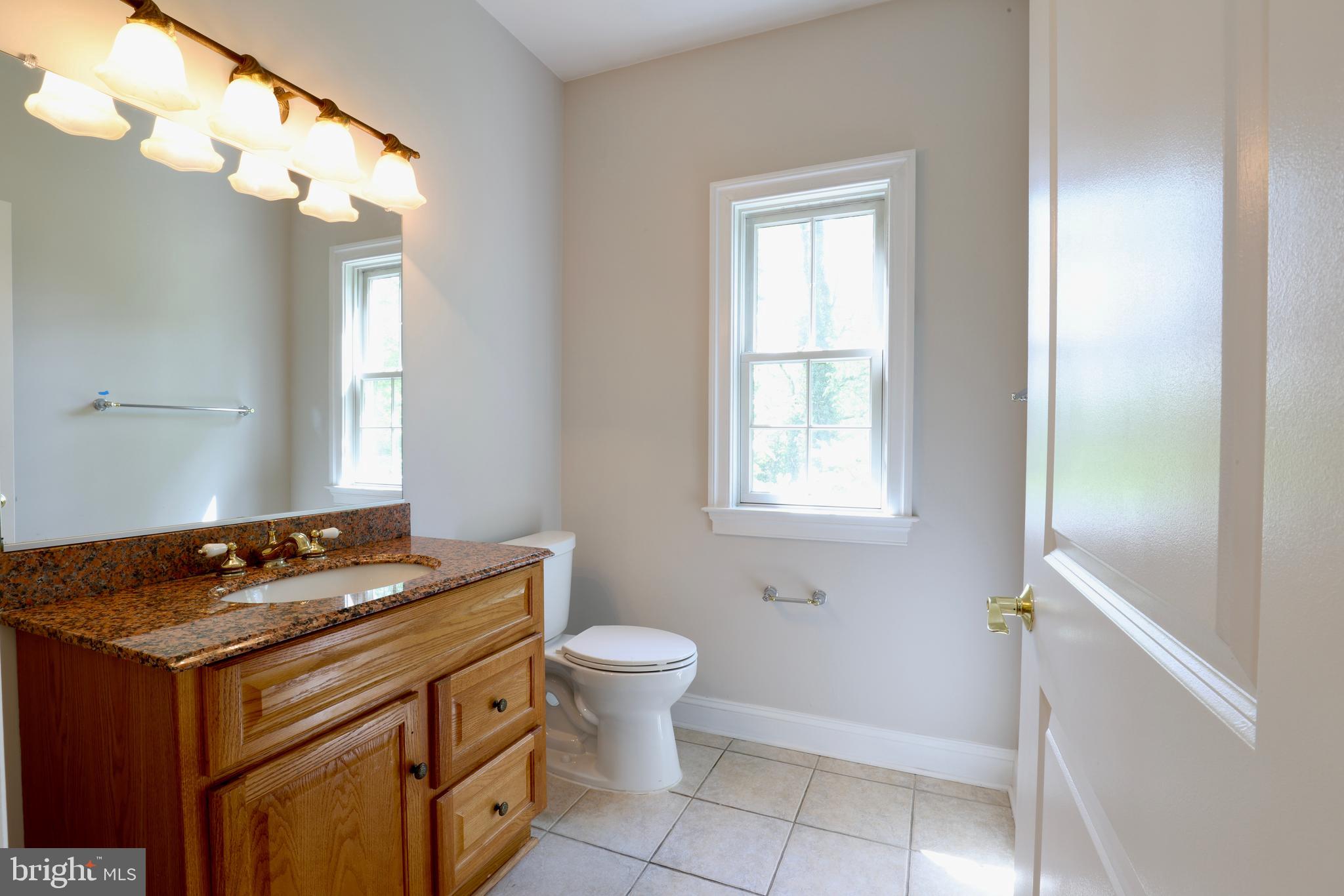 1310 Forestwood Drive McLean, VA 22101 - Photo 23 of 55 a view of a bathroom with a sink