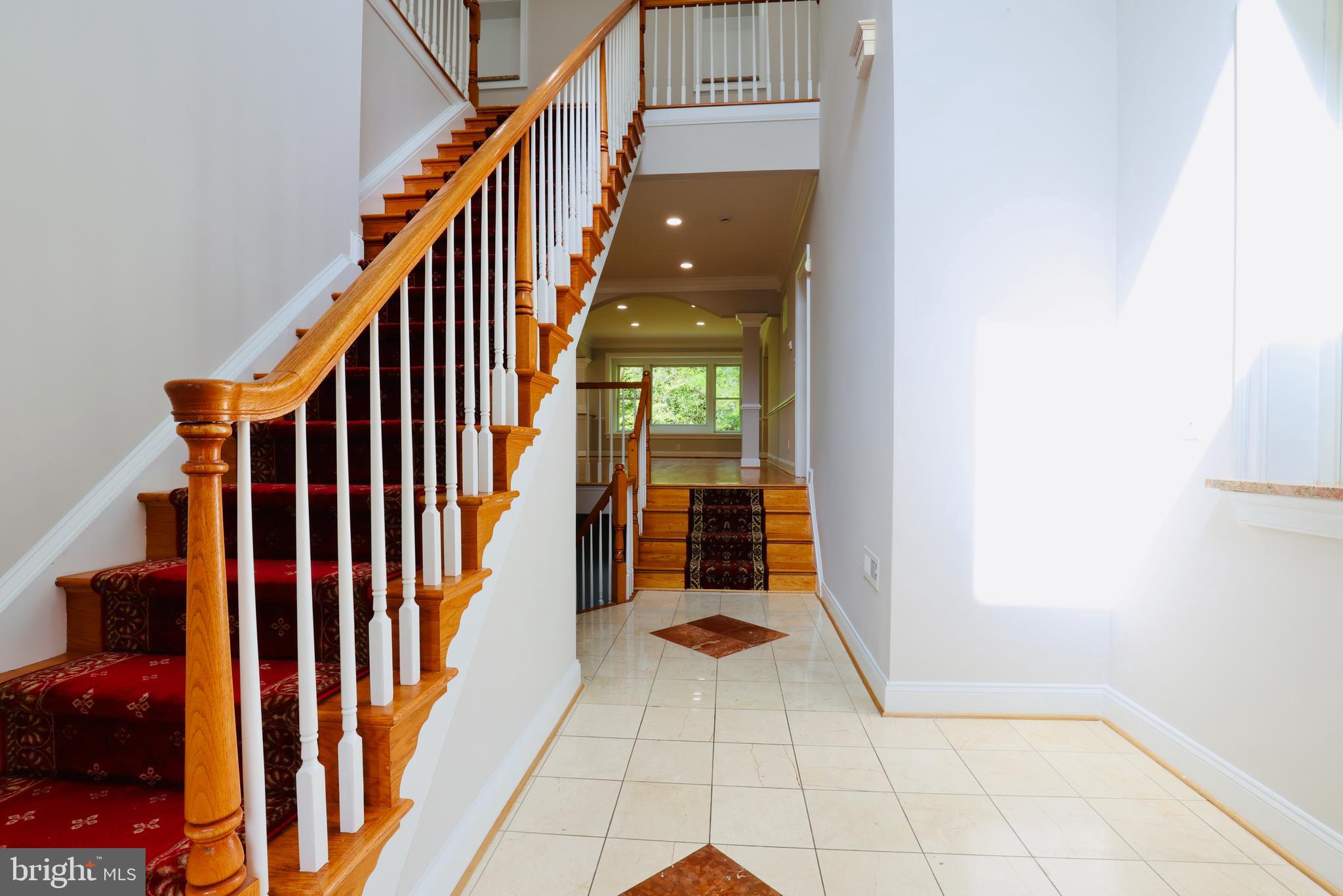 1310 Forestwood Drive McLean, VA 22101 - Photo 3 of 55 a view of entryway and hall with wooden floor
