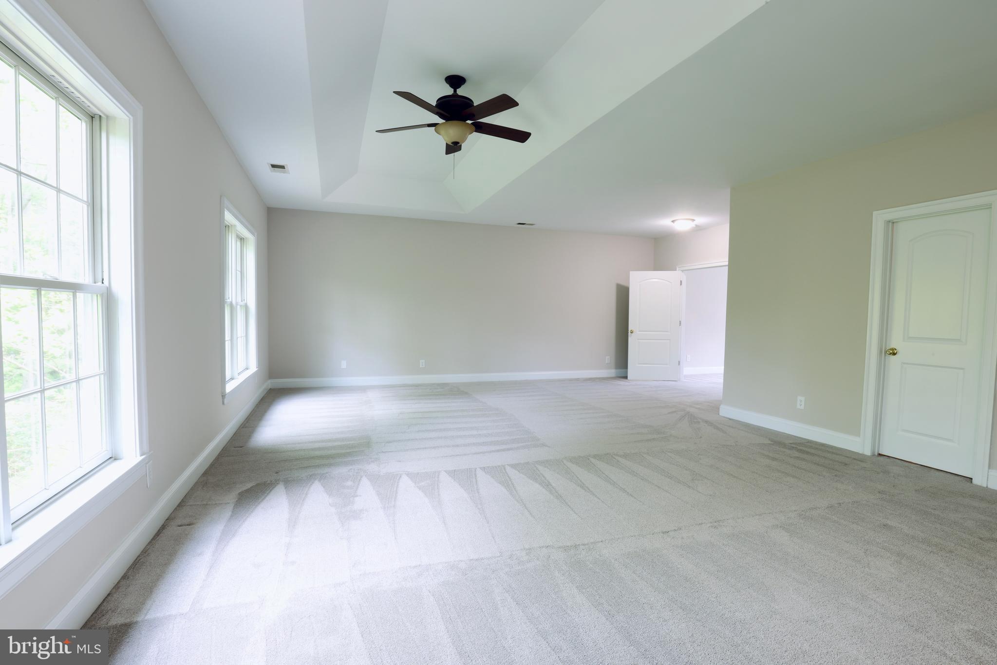 1310 Forestwood Drive McLean, VA 22101 - Photo 32 of 55 an empty room with a empty space and windows