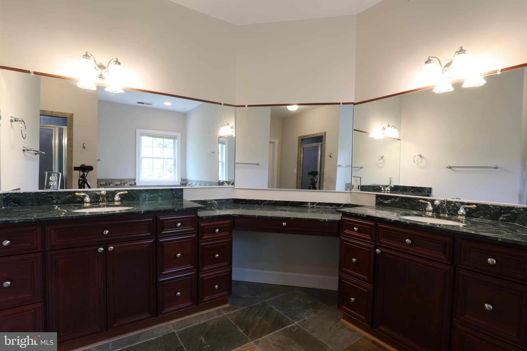 1310 Forestwood Drive McLean, VA 22101 - Photo 37 of 55 a large kitchen with a sink and dishwasher with wooden floor