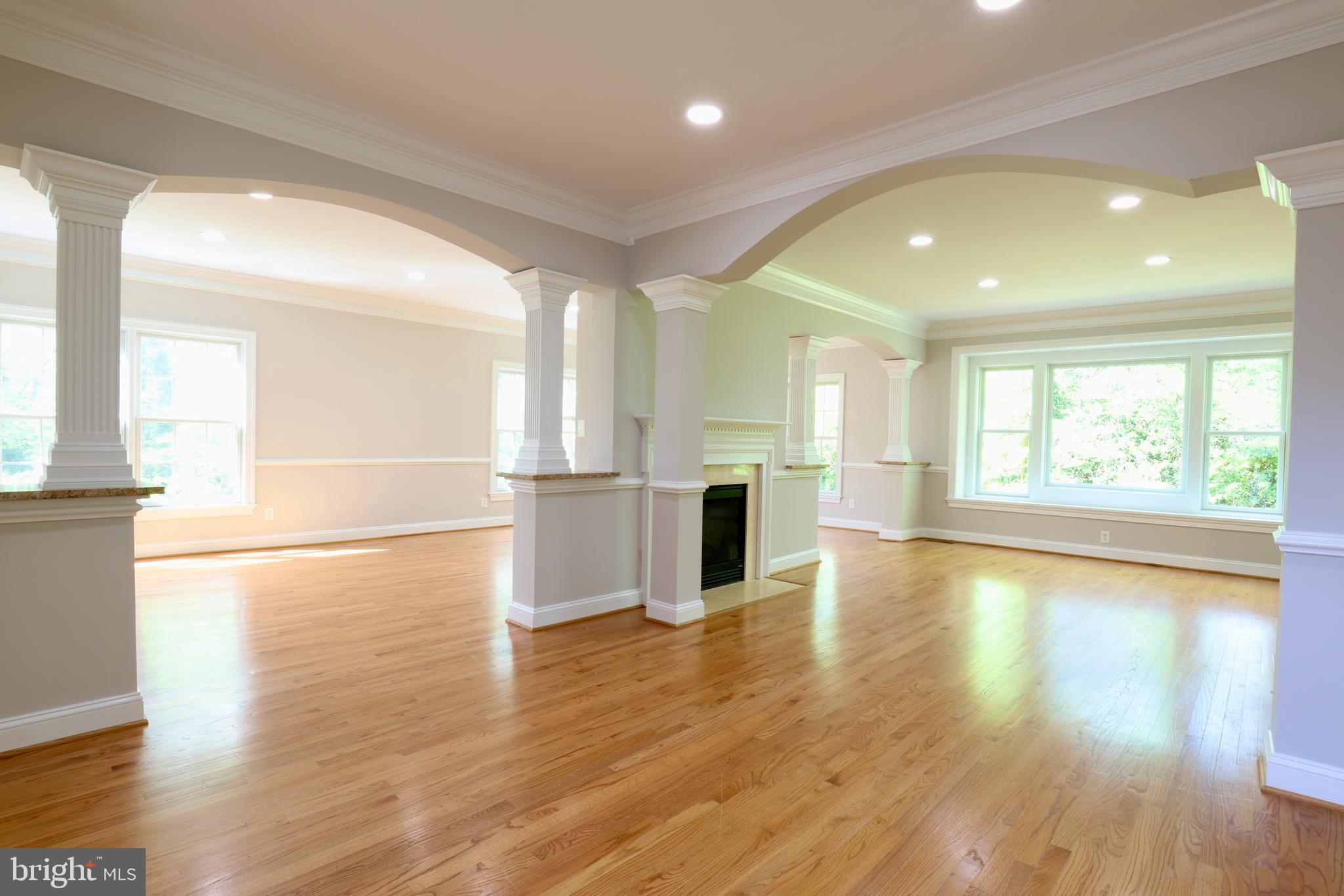 1310 Forestwood Drive McLean, VA 22101 - Photo 6 of 55 a view of empty room with wooden floor and windows