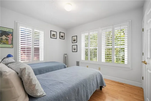 a bathroom with a bathtub sink and mirror