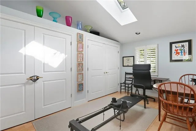 a bathroom with a toilet sink and shower