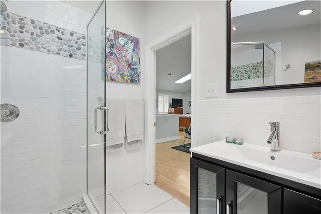 a view of a dining room with furniture and front door