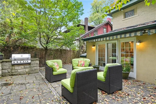 a view of two chairs in the balcony