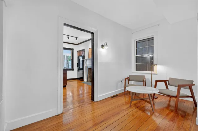 a kitchen with stainless steel appliances granite countertop a sink stove and wooden cabinets