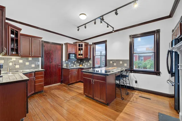 a bedroom with a bed and a table