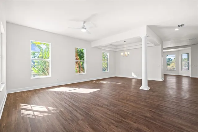 a view of an empty room and window