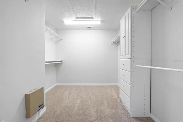 a view of an house with backyard and garden