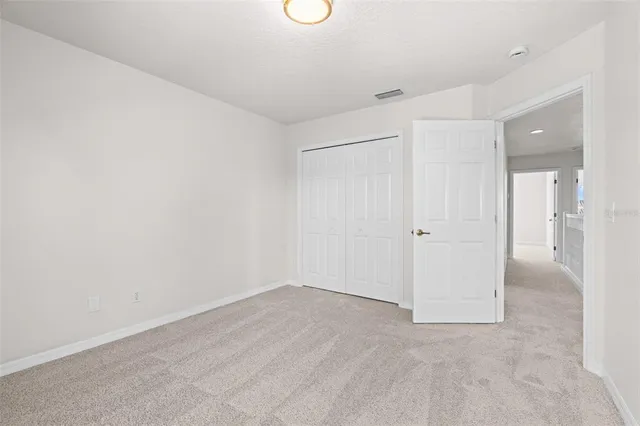 an aerial view of residential houses with outdoor space and swimming pool