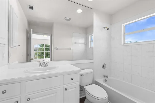 a view of a lake with a garden