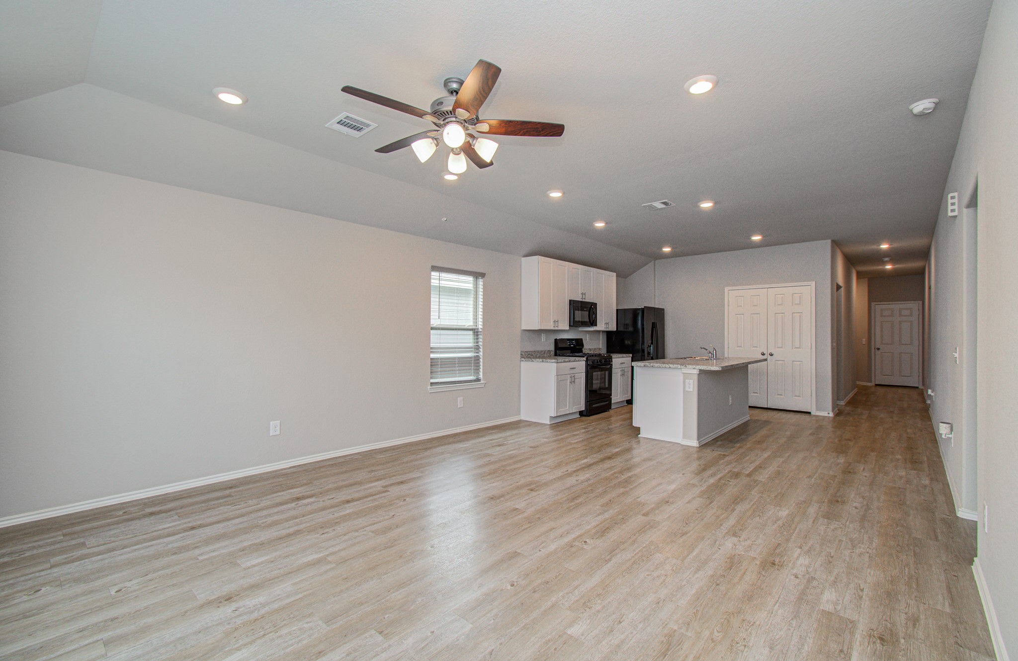 2030 Brixham Bluff Lane Spring, TX 77373 - Photo 10 of 29 open living and dining area
