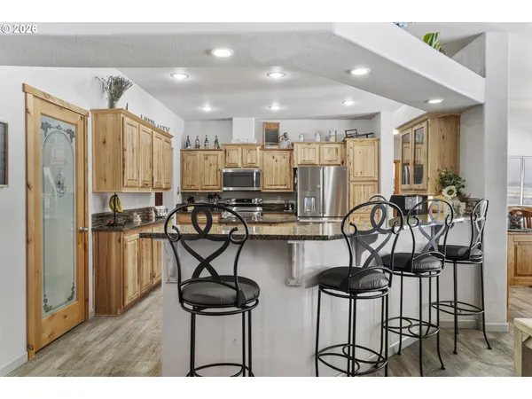 a view of a dining room with furniture
