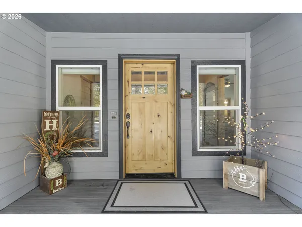 a view of entryway with wooden floor