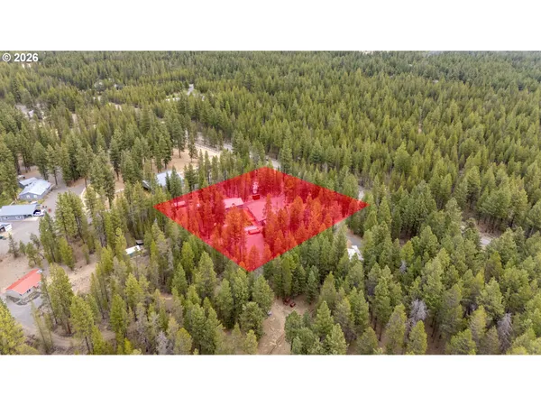 a black and white photo of a house