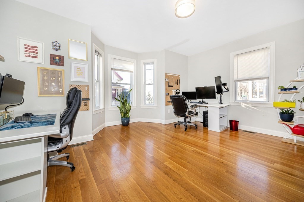 15 Vine Street Medford, MA 02155 - Photo 17 of 23 a view of a workspace with furniture and a window