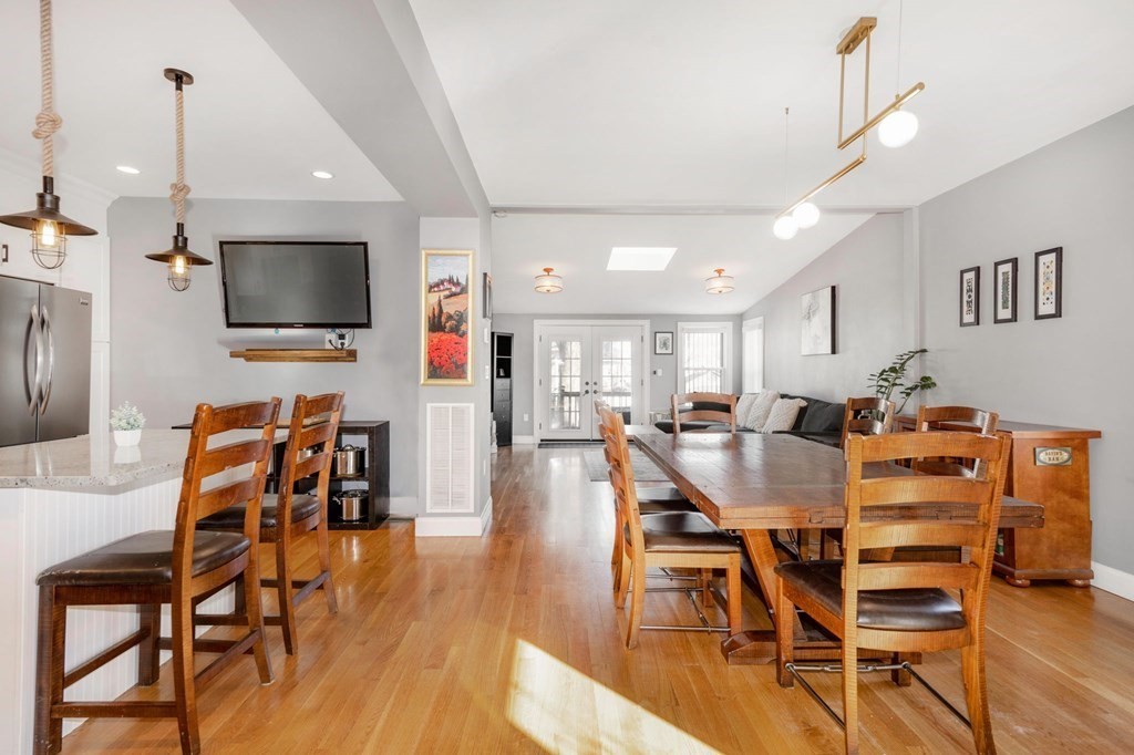 15 Vine Street Medford, MA 02155 - Photo 5 of 23 a view of a dining room with furniture and wooden floor