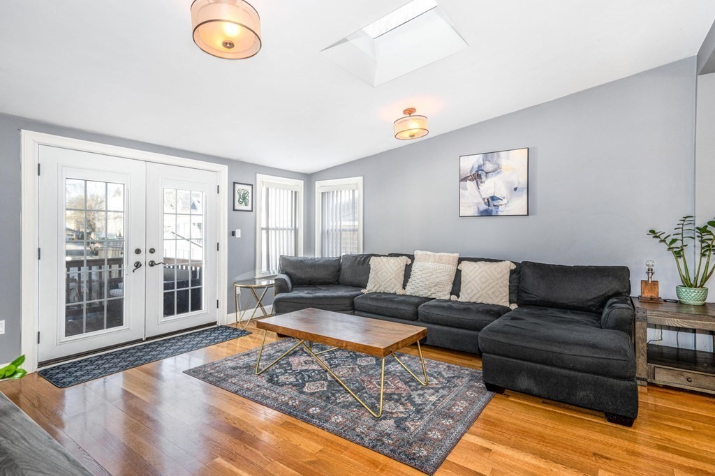 15 Vine Street Medford, MA 02155 - Photo 8 of 23 a living room with furniture and a large window