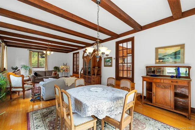 a kitchen with refrigerator and cabinets