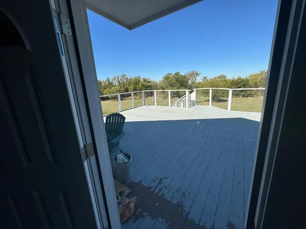 a view of a balcony with an outdoor space